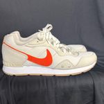 Nike Cream and Orange Sneakers Photo 5