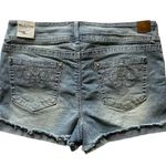 NWT--DENIM SHORTS-SIZE 13 /31 Wallflower luscious curvy fit stretch shorts, brand new, size 13 Measurements: Waist: side to side 18 inches Inseam: 3 inches Photo 4