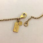 Kate Spade  Gold Tone Gold Enamel Bow Long Necklace Photo 4