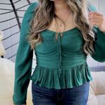 House of Harlow 1960 M
Emerald Green Ruched Peplum Top
Long Sleeve Photo 0