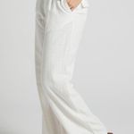Showpo larissa mid waisted relaxed straight leg trousers in white Photo 1