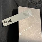 Head  size XS women's stability short skort slim fit black dri-motion pleated Photo 7