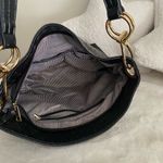 Black and Gold Shoulder Bag with Luxurious Texture Photo 4
