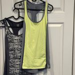 Champion  Women's Yellow and Black Tank Tops Photo 1