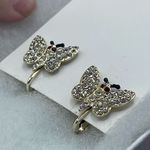 Vintage rhinestone encrusted butterfly earrings. Gold Photo 2