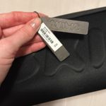 SKIMS NWT Neoprene long zip pouch Photo 1