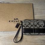 Coach  Legacy Signature Leather Trim Wristlet Monogram Canvas Brown Gold Tone Photo 0