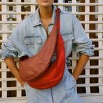 Free People NWOT  idle hands sling bag in brown Depth: 2.2in /Width: 15.7in  Photo 1