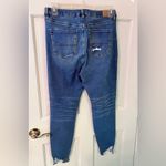 American Eagle  Ultra High-Rise Super Skinny Ripped Denim Blue Jeans Photo 2