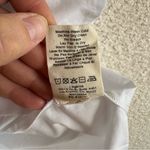 L'Agence L’agence NWOT Women’s White Cold Shoulder Blouse Size L Photo 11