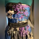 “Strapless dress with an abstract print in shades of blue, purple, and black. Blue Size 4 Photo 1