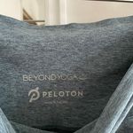 Beyond Yoga x Peloton Heathered Light Blue Caught in the Midi Leggings Photo 3