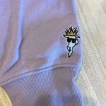 GOAT USA Lavender Women’s Front Logo Crewneck Sweatshirt Photo 4