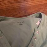 Out From Under  Green Top Photo 1