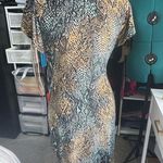 Nine West Snakeskin print fitted dress with a V-neckline and buckle details at the waist. Photo 3