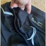 Under Armour  HeatGear Running Shorts Black White Women’s M Medium Loose Fit Photo 2