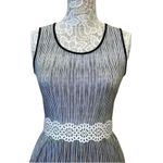 Elle Sleeveless Gray Dress with Lace Waist & Handkerchief Hem Photo 2