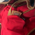 Dooney & Bourke  Navy Suede Bucket Bag Brown Leather Drawstring Tassel Photo 8