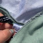 Divided green tank top Photo 6