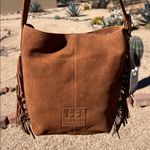 Haute Hippie | Honey Tan Suede Bucket Bag w/ Fringe and Adjustable Buckle Photo 0