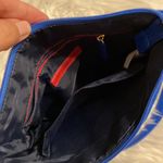 Tommy Hilfiger  Crossbody Blue color excellent condition no rips smells or stains Photo 10
