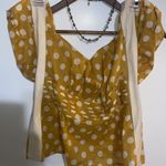 Tory Burch polka dot short sleeve blouse in mustard yellow Photo 6