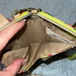 Sakroots  crossbody wristlet removable adjustable straps zip around close pockets Photo 6
