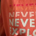 The North Face Emberglow Orange Never Stop Exploring Cropped Hooded Sweatshirt Photo 2