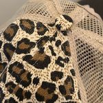 Charming Charlie ’s Criss Cross Leopard Ponytail Trucker Hat Photo 7