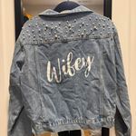 NWOT Wifey Denim Jacket with Pearl Accents Blue Photo 1