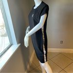Calvin Klein  dress size Large 
In great condition 
Stretchy 
Logo on both sides Photo 2