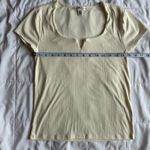 Eye Candy Cream Lined T shirt Photo 5