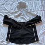 Nike  Womens Size Large Windbreaker Sportswear Windrunner Black White Hooded Photo 7