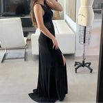 Women size small long black dress with small train bust and waist mesh detail Photo 1