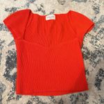 Victoria and Sophia  Orange Top Photo 0