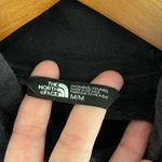 The North Face Women’s black multi color logo hoodie sweatshirt Medium Photo 3