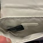 Kendall + Kylie Black and White Crossbody Bag with Semi-Circular Design Photo 6