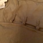 NWOT Bloomingdale’s khaki green tee shirt.Short sleeves.Button closure. Size PS. Photo 2