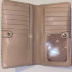 Kate Spade Staci Colorblock Large Slim Bifold in Warm Beige & Black Photo 4