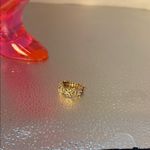 Beautiful gold ring with dainty flowers. There are three flowers adjustable Photo 3