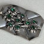 Vintage 1940’s C clasp brooch. Silver colored green glass Photo 1
