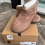 UGG  Classic Ultra Mini Biarritz Genuine Shearling Lined Bootie Photo 0