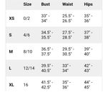 Live to be spoiled like green eyelet smocked cut out ruffle cinched mini dress Photo 4