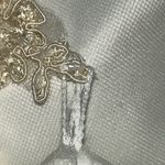 David's Bridal . Style T8818 size 10 wedding dress. 
Worn once. Was cleaned. Photo 13