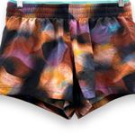 Fabletics  Breathe Mid Rise Run Shorts in Meltdown/Crystal Wave/Reflective Silver Photo 2