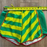 Nike  Dri-Fit Athletic Shorts Women's size Small in Green Yellow stripes running Photo 8