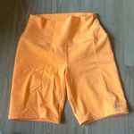 Alo Yoga Alo Bright Orange Biker Shorts Photo 0