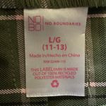 No Boundaries Super cute green plaid pleated skirt, side zipper, like new condition. Size 11/13 Measurements: Waist: side to side 16 inches  Length: waistband to bottom 16 inches Photo 6