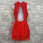 ASTR the Label Orange Lace Open Back Romper Photo 2
