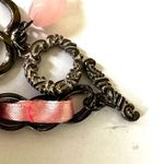 pink ribbon silver tone flower bracelet Photo 4